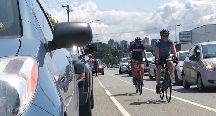  Drivers can help keep cyclists safe in the 'door zone' by practising the 'Dutch Reach,' a technique that includes a look back before opening a car door. Photo by Andy Prest/North Shore News