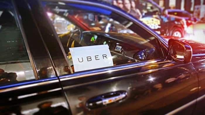  The City of Burnaby plans to put ride-hailing services on a level playing field with taxis by requiring a business licence to operate in the city. Photo: Uber / Shutterstock