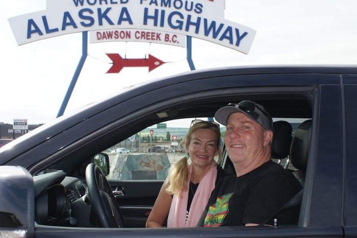 Michael and Lisa Dawson of Sydney, Australia headed north from the Alaska Highway’s Mile Zero in Dawson Creek Thursday. They live not far from the father of Lucas Fowler found dead on the highway July 15. Photo by Jeremy Hainsworth/Glacier Media