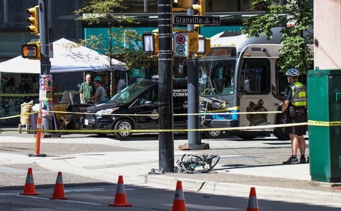  Vancouver police collision investigators had a corner of Pender and Granville streets cordoned off after a cyclist was hit by a vehicle. Photo Bradley Fehr