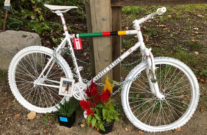  This tribute to Charles Masala has been chained to a post on Gaglardi Way in Burnaby. Photo: Chris Campbell