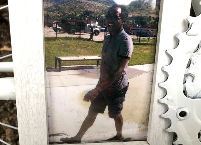  A photo of Charles Masala was left at the memorial. Photo: Chris Campbell