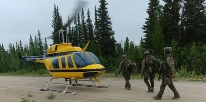  RCMP search the area near Gillam, Man. in this photo posted to their Twitter page on Friday, July 26, 2019. Officers are in the Gillam area to search for 18-year-old Bryer Schmegelsky and his 19-year-old friend Kam McLeod. The teens are charged with second-degree murder in the death of one man and are suspects in the fatal shootings of a young couple. Photo: The Canadian Press / Ho, Twitter, Manitoba RCMP, @rcmpmb