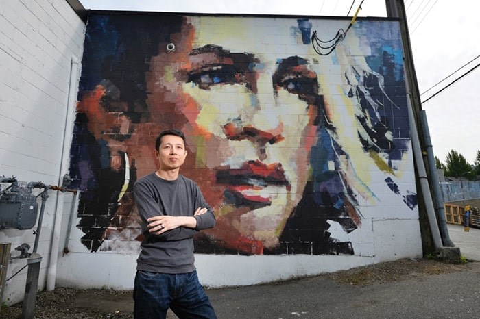  William Liao stands with his completed work for Vancouver Mural Festival. This year's festival starts Thursday and will feature 25 new murals. Photo Jennifer Gauthier