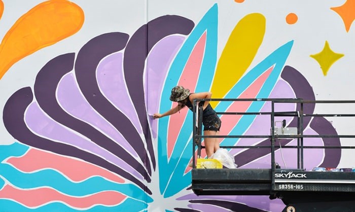  Olivia di Liberto works on her mural for Vancouver Mural Festival. This year's festival starts Thursday and will feature 25 new murals. photo Jennifer Gauthier