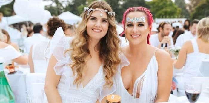  Dîner en Blanc expert Alexandra Thompson (right), shown here with fellow outdoor dining dazzler Kirsten Donald, shares some of her secrets for throwing an unforgettable outdoor dinner party. Photo: Alexandra Thompson