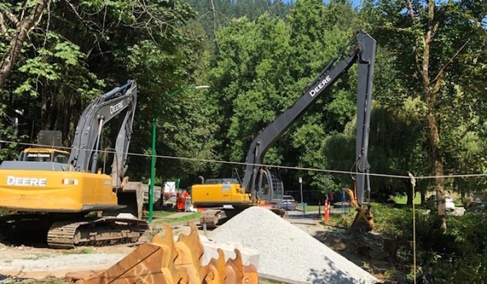  Machines work to clear material for the Ash Grove culvert project in North Burnaby. An area resident says too many trees were cut down, and without sufficient warning. Photo by Chris Campbell/Burnaby NOW