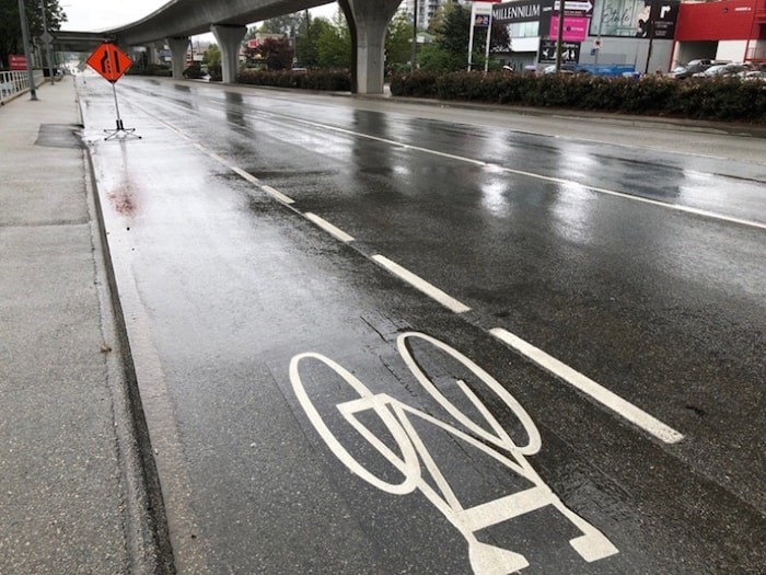  Several spots along this bike lane were blocked by construction signs on Lougheed Highway in Burnaby. Photo by Chris Campbell/Burnaby NOW