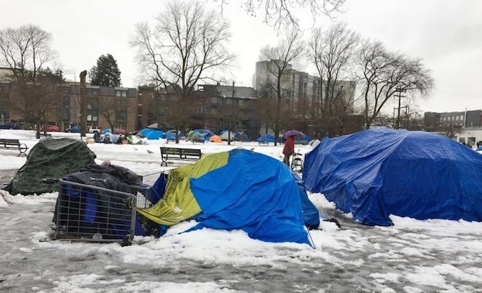  According to a new survey by the Strathcona Business Improvement Association, the majority of businesses in and around Oppenheimer Park say something needs to be done about the ever-growing number of campers in the park. File photo Dan Toulgoet