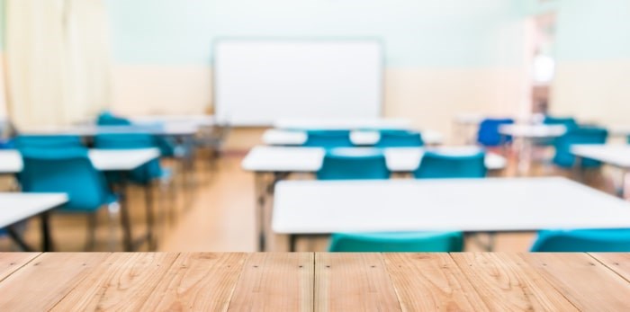  A teacher in the eastern Fraser Valley was suspended after she engaged a student in unwanted text messaging and shared details about her personal life. Photo: Classroom/Shutterstock