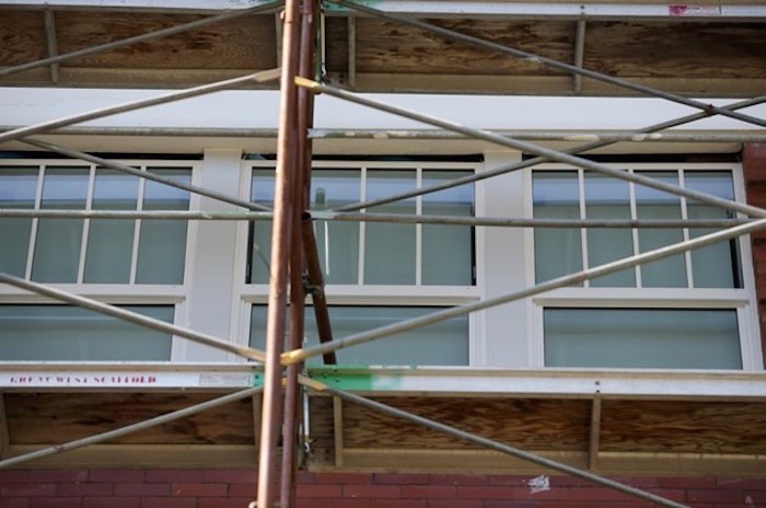  The exterior of Mount Edwards Court, with renovations under way, at 1002 Vancouver St. Photo by Adrian Lam/Times Colonist