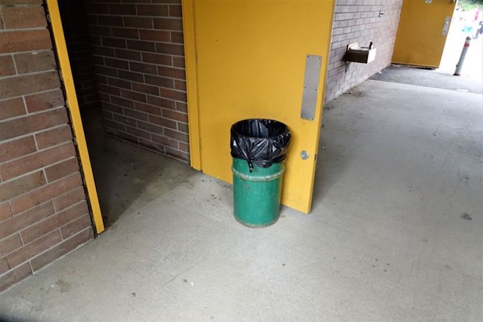  A City of Burnaby garbage can propping open a door at Deer Lake. Photo courtesy John Preissl