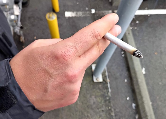  A contraband cigarette being smoked in Vancouver. Photo Bob Kronbauer