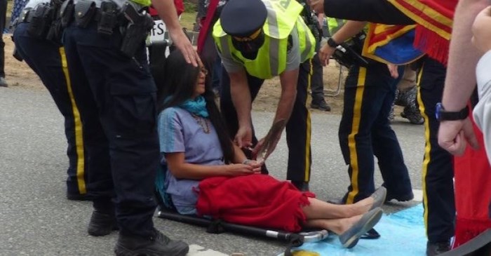  This photo of Rita Wong being arrested is posted on the 