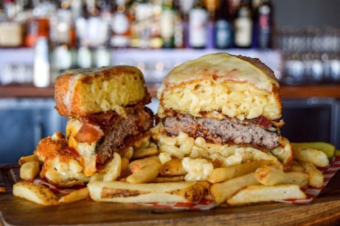  Cavu kitchen bar's Le Big Mac N' Cheese Burger. Photo via Le Burger Week