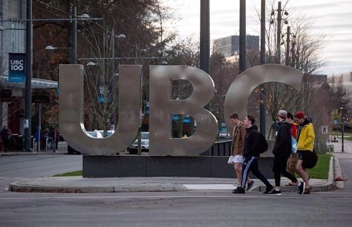  People walk past large letters spelling out UBC at the University of British Columbia in Vancouver on Nov. 22, 2015. THE CANADIAN PRESS/Darryl Dyck