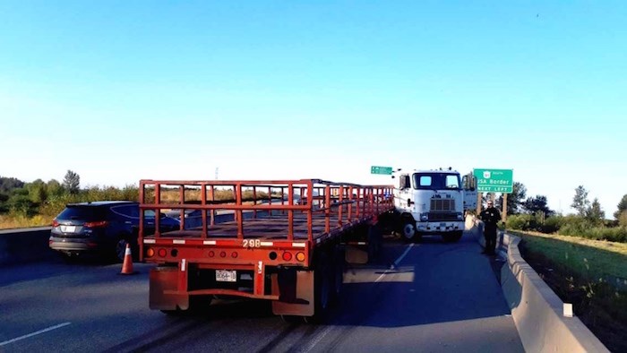  The driver of a semi-trailer that jackknifed westbound on Highway 17 Tuesday morning didn’t have insurance on either the cab or trailer. Photo courtesy Delta Police Traffic Unit