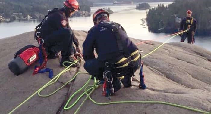  District of North Vancouver firefighters used ropes to rescue a teen stuck on a ledge below Quarry Rock Monday. photo supplied District of North Vancouver Fire & Rescue