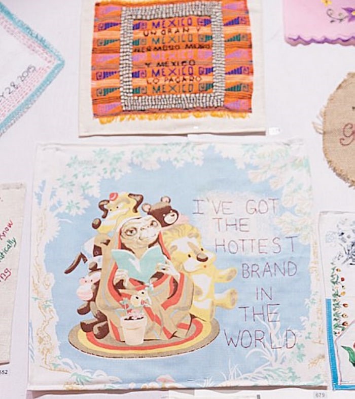  A Donald Trump quote adorns a piece of E.T.-themed fabric at Lingua Franca’s Tiny Pricks exhibition in New York City. Photo by Yvonne TNT/BFA.com