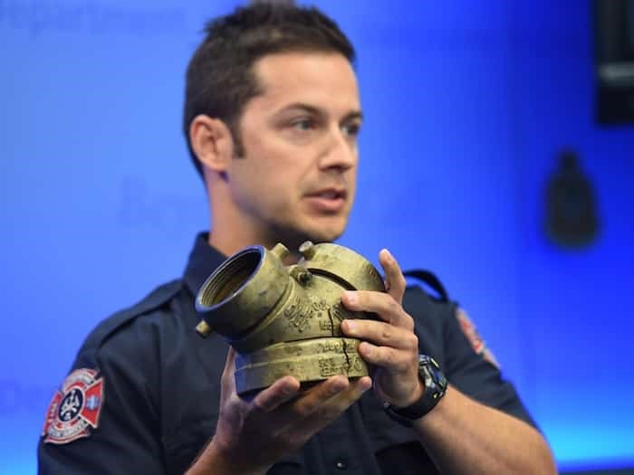  Vancouver Fire and Rescue Services fire prevention inspector Matthew Trudeau shows one of the standpipe connections stolen from the exterior of buildings downtown and in the DTES.