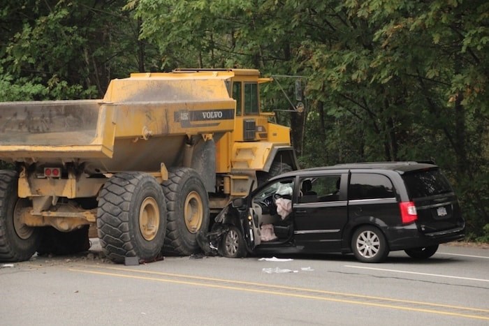  In 2017, an unoccupied dump truck rolled down a hill from a Riverview job site and onto Lougheed Highway in Coquitlam, killing the driver as he jumped out of the truck and a passenger in another vehicle. Photo by Shane Mackichan/Tri-City News