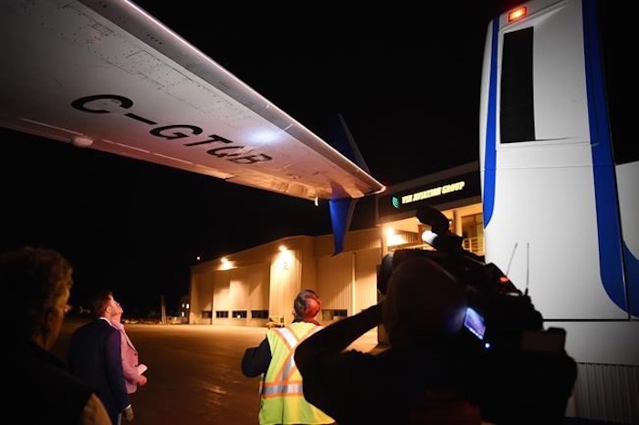  Members of the media inspect the wing from Liberal Leader Justin Trudeau's campaign plane after being struck by the media bus following landing in Victoria, B.C., on Wednesday, Sept.11, 2019. THE CANADIAN PRESS/Sean Kilpatrick