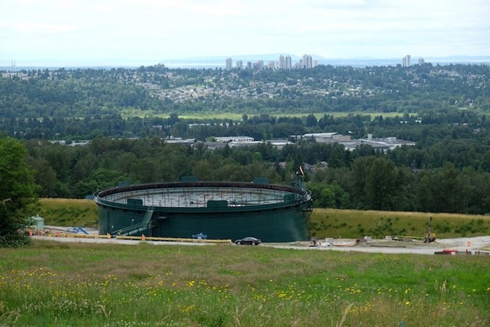  Kinder Morgan wants to tunnel or bore a pipeline through Burnaby Mountain to connect the tank storage facility (seen here) with the Westridge Marine Terminal, where tankers fill up with crude. Photo by Larry Wright/Burnaby NOW
