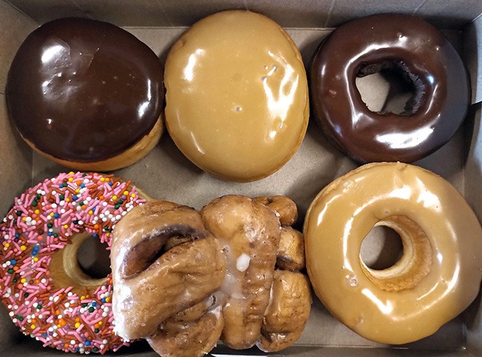  Opening a traditional box of donuts is pretty great. Photo Bob Kronbauer