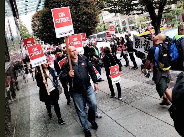  Unionized workers from three Vancouver hotels walked off the job Thursday. @unitehere40/Twitter