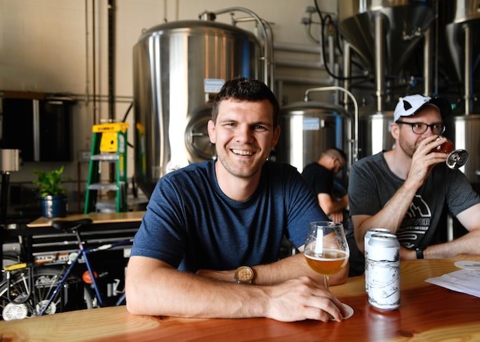  Clete Hanson enjoys a beer at Another Beer Co., the craft brewery he recently opened with Alex Jopson. Photo by Jennifer Gauthier