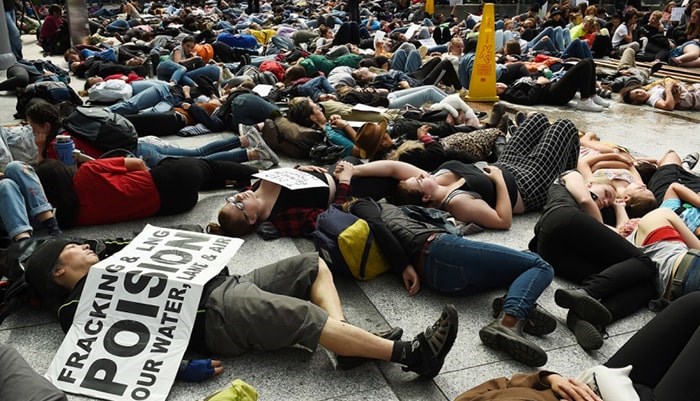  Sustainabiliteens Vancouver held a die-in for action against climate change Friday downtown at different locations, including Teck Resources Ltd., marched to the Vancouver Art Gallery to end their day of protest. Photo Dan Toulgoet