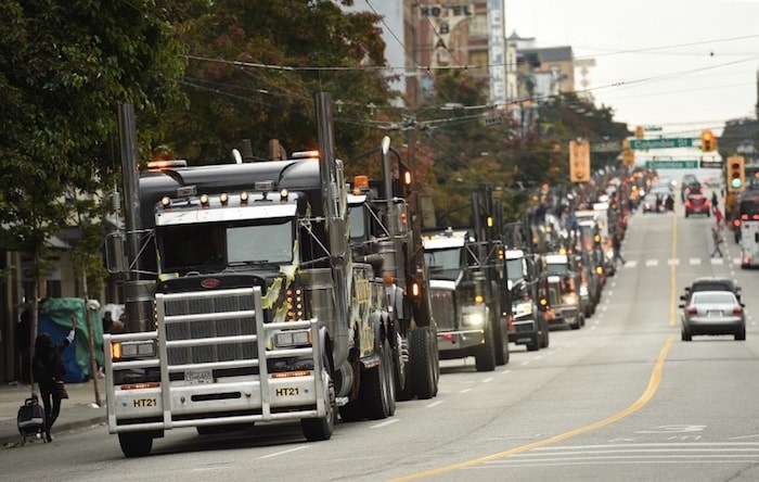  Hundreds of logging trucks lined up along Hastings Street as they made their way into Vancouver to protest the state of the B.C.’s forestry industry. Photo Dan Toulgoet