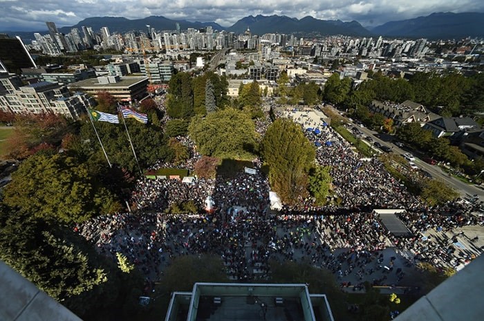  Tens of thousands attended the Global Climate Strike at Vancouver city hall Sept. 27 before marching over the Cambie Street Bridge into downtown. Photo Dan Toulgoet