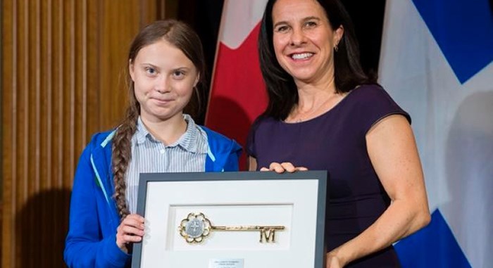  Swedish climate activist Greta Thunberg, left, receives the key to the city from Montreal mayor Valerie Plante during a ceremony in Montreal, Friday, Sept. 27, 2019. THE CANADIAN PRESS/Graham Hughes