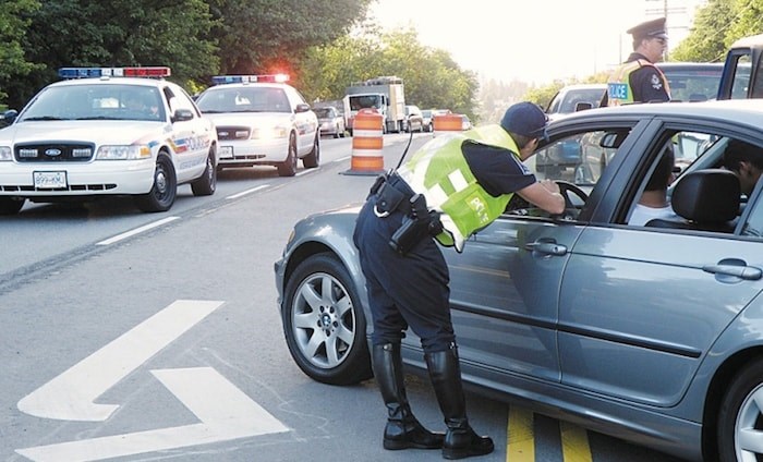  Burnaby RCMP officers are warning people about driving while impaired. Burnaby NOW file photo