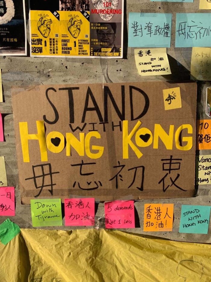  Pro-China supporters tore down this makeshift 