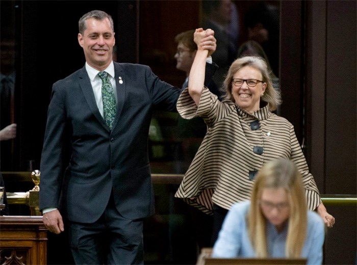 Green Party Leader Elizabeth May enters the House of Commons with the newly sworn in Green MP Paul Manly. Monday, May 27, 2019. Photo Adrian Wyld, The Canadian Press