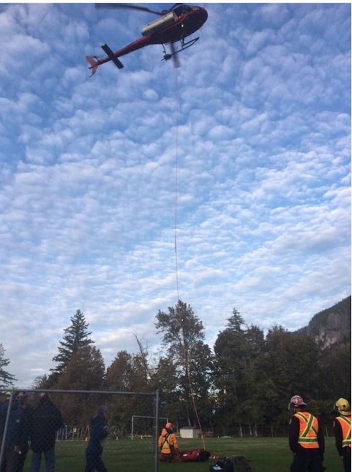  On Oct. 1, at 5:15 pm, Squamish RCMP say they were requested by the BC Ambulance Service to attend to the Stawamus Chief for a mountain bike medical call. Upon arrival to the staging location of the Stawamus School, police met up with Squamish Fire Rescue and Squamish Search and Rescue and learned a woman and man were mountain biking in the Slhaney Trail system behind Stawamus Chief Provincial Park when the woman was seriously injured in an incident on her bike. The woman was Mikayla Martin. The. man was not seriously injured. SAR volunteers long-lined Martin to the waiting air ambulance, but she did not survive. Photo courtesy Squamish RCMP