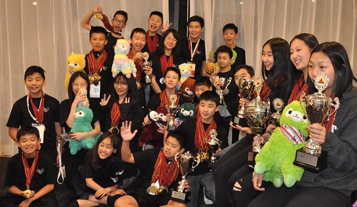  The Scholar's Cup team show off their medals and trophies. Photo: PACE Learning Community