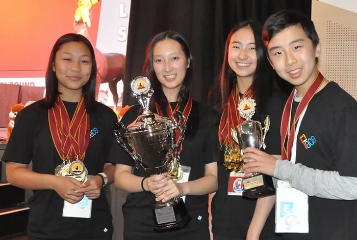  The Scholar's Cup team show off their medals and trophies. Photo: PACE Learning Community