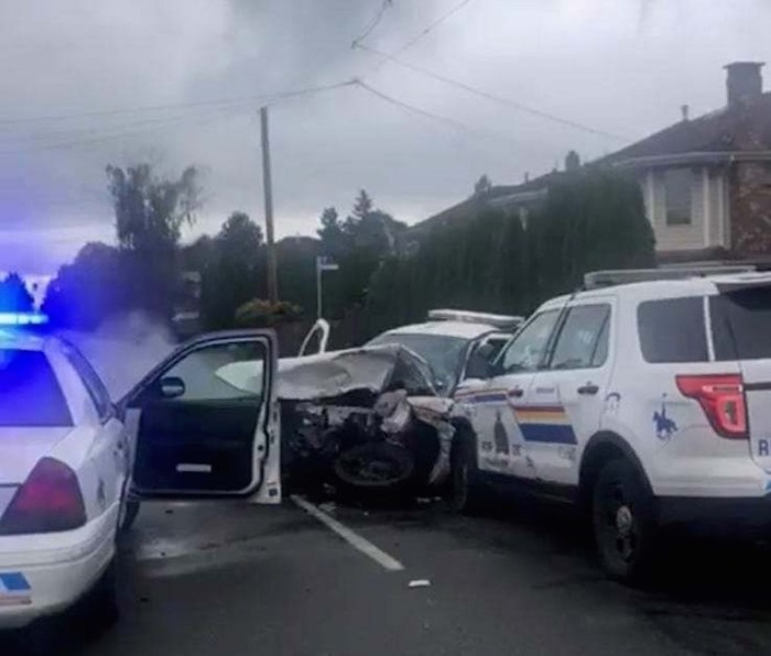  This photo shows how one police cruiser appears to have rammed head-on into another. Facebook photo