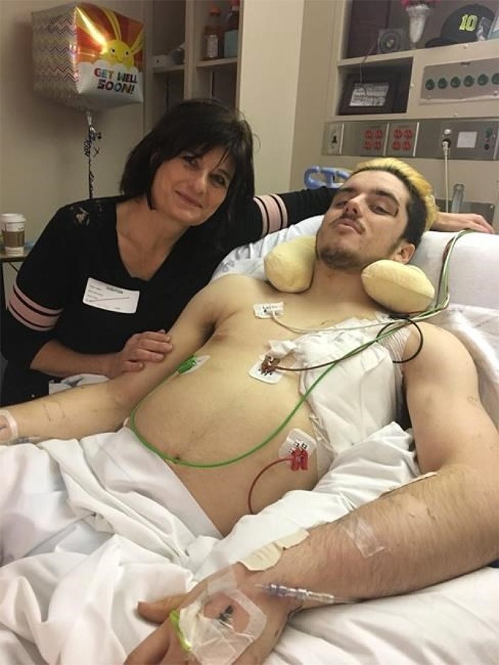 Saskatchewan nurse Vivian York, visits Broncos player Ryan Straschnitzki in a Saskatoon hospital in April, 2018 as shown in this image provided by Ryan's father Tom Straschnitzki. York was the first person at the scene of the crash which killed 16 people and injured 13 others, including Straschnitzki. THE CANADIAN PRESS/HO-Tom Straschnitzki **