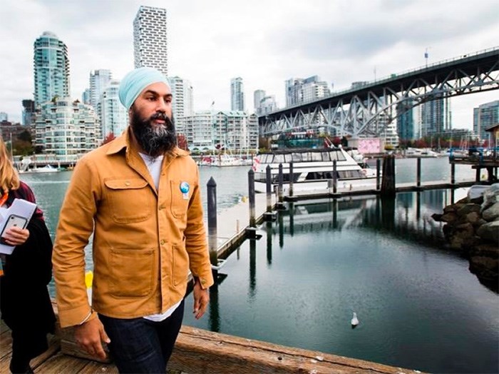  NDP leader Jagmeet Singh leaves the boardwalk after speaking to the media during a campaign stop at Granville Island in Vancouver, B.C., on Monday, October 14, 2019. THE CANADIAN PRESS/Nathan Denette