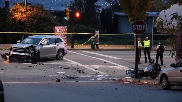  One man is in hospital with serious injuries after an afternoon crash in Burnaby Heights at the corner of Hastings Street and Ingleton Avenue. Photo by Shane MacKichan/Burnaby NOW