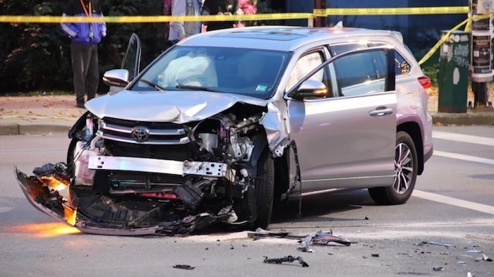  One man is in hospital with serious injuries after an afternoon crash in Burnaby Heights at the corner of Hastings Street and Ingleton Avenue. Photo by Shane MacKichan/Burnaby NOW