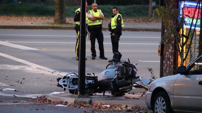  One man is in hospital with serious injuries after an afternoon crash in Burnaby Heights at the corner of Hastings Street and Ingleton Avenue. Photo by Shane MacKichan/Burnaby NOW