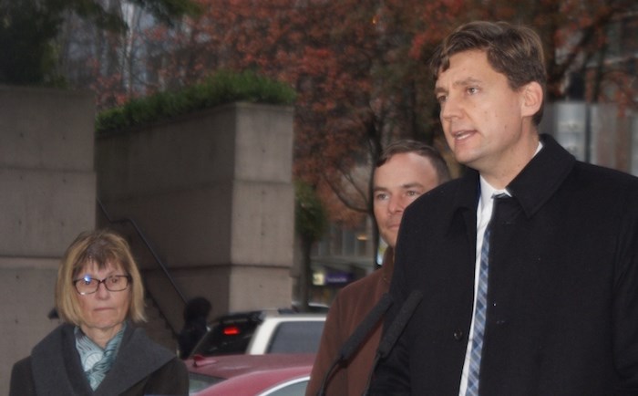  Attorney General David Eby (right) announces a deal with legal aid lawyers as MLA Spencer Chandra Herbert and Legal Services Society chair Jean Whittow look on. Photo by Jeremy Hainsworth/Glacier Media