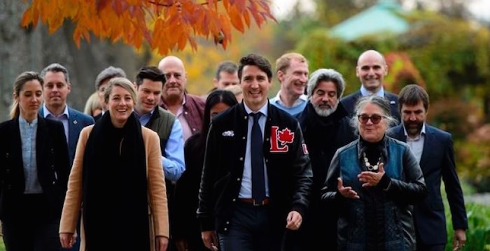  Liberal leader Justin Trudeau walks with Liberal candidates during a campaign stop at the Botanical Garden in Montreal on Wednesday Oct. 16, 2019. THE CANADIAN PRESS/Sean Kilpatrick