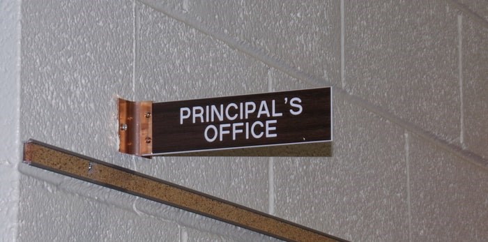  B.C.’s Commissioner for Teacher Regulation has suspended a high school principal for failing to tell a mother her child had complained of inappropriate touching by another teacher. Principal's office/Shutterstock