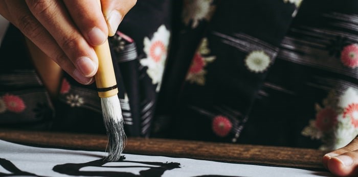  Shop for arts and crafts, or take part in a cultural workshop that includes instruction in calligraphy at the Japan Market Vancouver's Christmas Fair. Photo: Japanese calligraphy/Shuttterstock